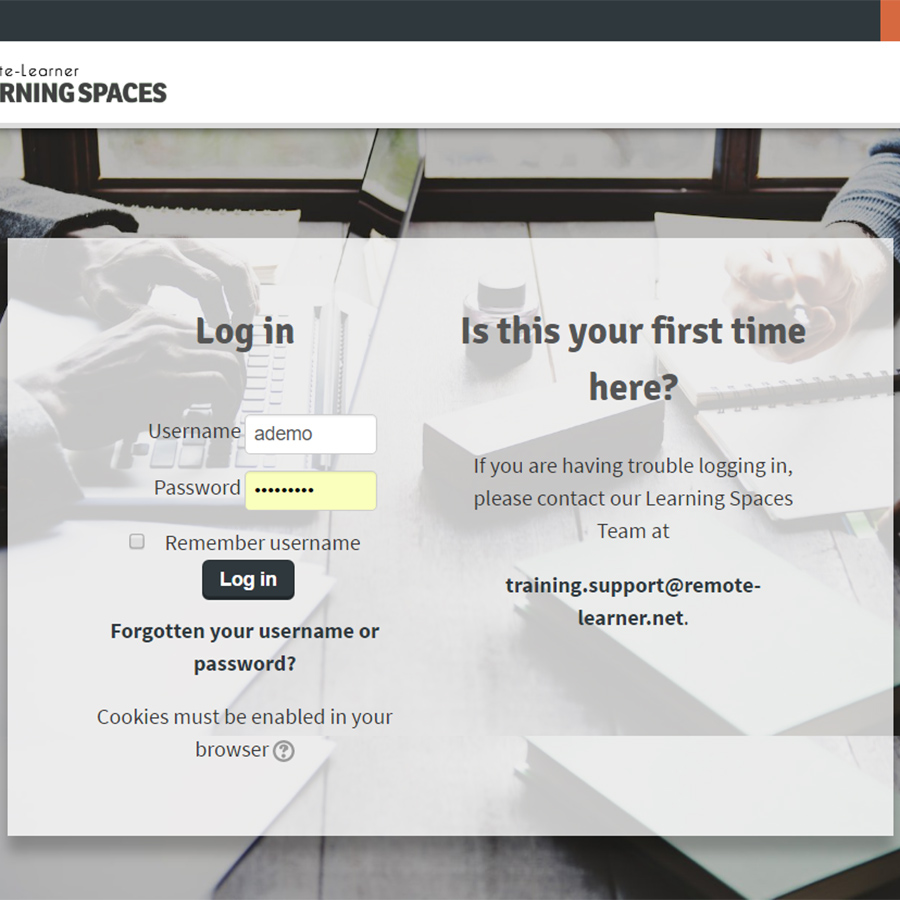 Login page with background image of people working